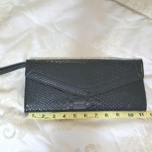 Apt. 9 Black clutch